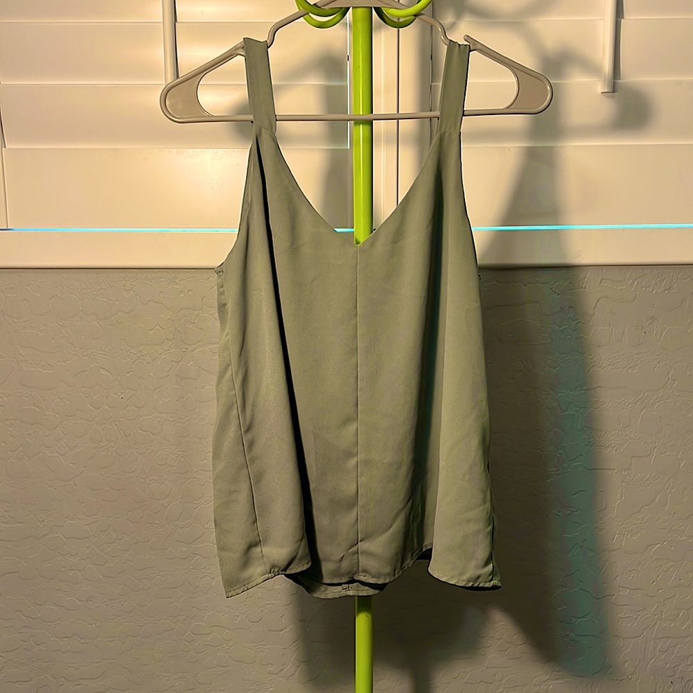 Mix between (olive and army green?) dress shirt/blouse.